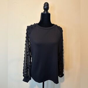 - black sweatshirt with sheer sleeves